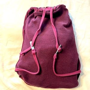 QuickFlip burgundy zipped hooded sweatshirt. Size Medium.